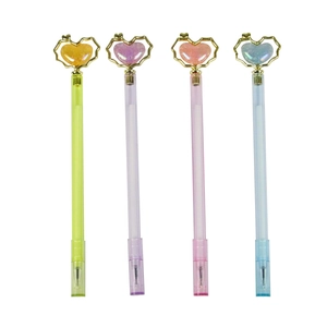 Set of four colorful crystal heart gel pens in yellow, purple, pink and blue shades