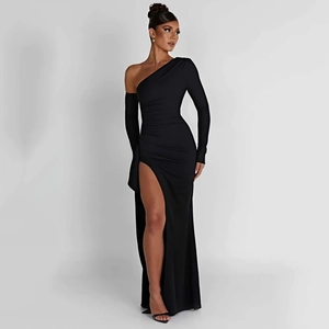 Detail of elegant black one-shoulder dress with high side slit and ruched fabric texture