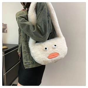 Close-up of fluffy white plush handbag featuring funny big eyes and orange lips design
