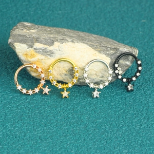 Star-shaped nose rings in rose gold, gold, silver, and black stainless steel with zircons