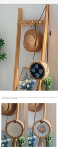 Detail of handmade shell inlaid round crossbody bags with woven textures and floral patterns