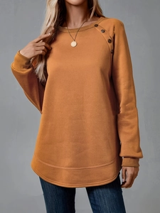 Eleganter ingwergelber Langarm-Sweatshirt mit Schulterknöpfen und einem geschwungenen Saum