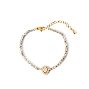 Elegant gold titanium tennis bracelet featuring a pear-shaped zircon pendant and lobster clasp