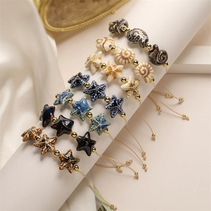 Starfish Snail Beaded Bracelet Handmade Ceramic Beads With Copper Accents Adjustable Braided Rope Bohemian Ocean Style