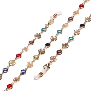 Golden eyewear chain with colorful crystals and butterfly charms for glasses or masks