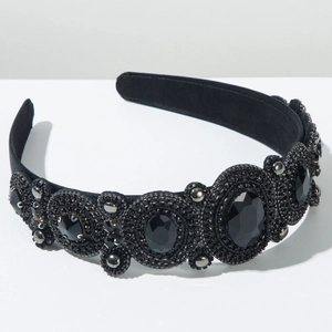 Detailed close-up of Baroque style headband with black rhinestones and luxury beadwork
