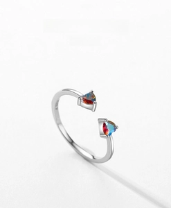 Detail of S925 sterling silver stamp on open ring with rainbow zircon hearts