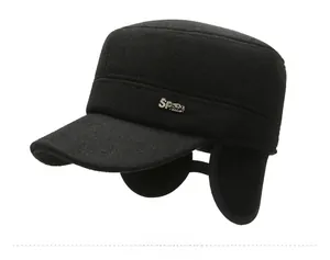 Detail of warm winter cadet cap with foldable ear flaps and Sport metal emblem