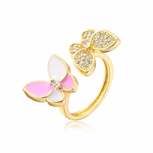 Close-up of dual butterfly ring with pink enamel and sparkling zircon inlay detail