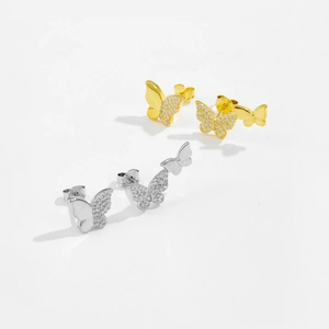 Detail shot of gold and silver S925 sterling silver butterfly earrings with pavé zircon