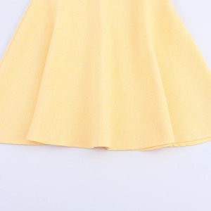 Completo giacca e abito in tweed giallo da donna con trama del tessuto in stile elegante