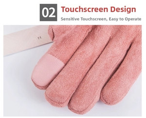 Detail of suede touchscreen winter glove showing pink finger pad for phone use