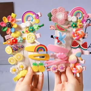 Colorful kids hair clips set featuring rainbow and candy shapes in macaron colors