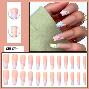 Matte long coffin press-on nails with colorful floral 3D patterns on nude base