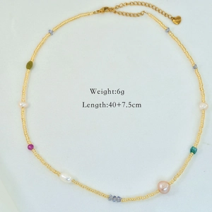 Detail of beaded necklace with pearls, colored stones, and 6g weight specifications