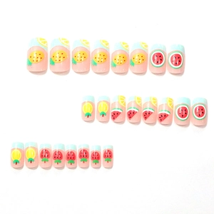Medium square press-on nails featuring colorful hand-painted fruit designs for summer