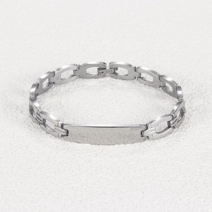Punk style stainless steel bracelet featuring a polished silver bar and hollow-out chain links