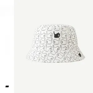Detailed embroidery of cartoon cat patterns on white cotton reversible bucket hat