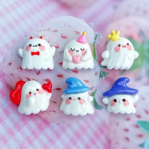 Set of 6 cute white resin ghost accessories with colorful bows and crowns on pink cloth