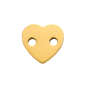 Detail of gold heart pendant charm with dual holes for DIY jewelry making and necklaces
