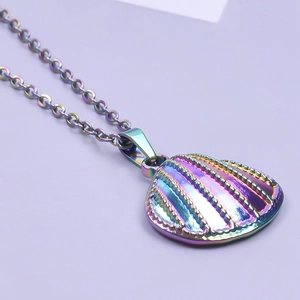 Detailed view of shell-shaped necklace with vibrant rainbow metallic gradient finish