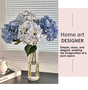 Close-up of realistic blue and purple 3D printed hydrangeas in a glass vase for home decor