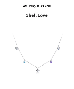 Detail of S925 sterling silver shell necklace with blue and purple crystal stones