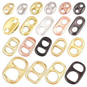 Polished soda tab and pig nose charms for DIY jewelry making in various metal finishes