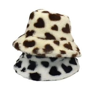 Detailed texture of plush bucket hats with brown and black heart patterns for women