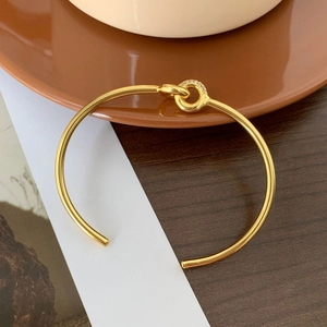 Elegant gold S925 sterling silver interlocking cuff bracelet with sparkling zircon stones