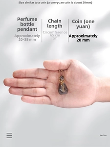 Macro view of smoky crystal perfume bottle pendant with gold chain dimensions