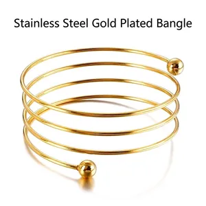 Five-layer spiral stainless steel gold plated bangle with polished metal beads