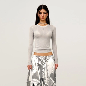 Slim fit metallic silver knit top with long sleeves and cross star detail for women