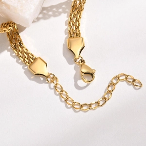 Flat woven mesh bracelet in gold stainless steel with lobster clasp and adjustable chain
