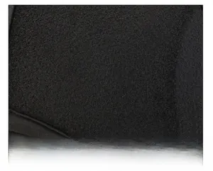 Close-up of the thick black fleece lining on a warm winter plaid baseball cap
