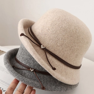 Chic wool cloche hat with leather strap and heart buckle for winter warmth