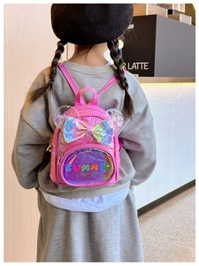 Detail of pink toddler backpack with sequin bow and transparent glitter mouse ears