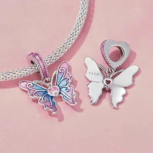 Pink and blue enamel butterfly charm in S925 sterling silver with pink heart zircon