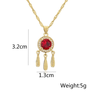 Detail shot of dreamcatcher pendant with red zircon and feather charms, 3.2cm length