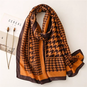 Classic houndstooth scarf and shawl in orange and brown tones for autumn and winter