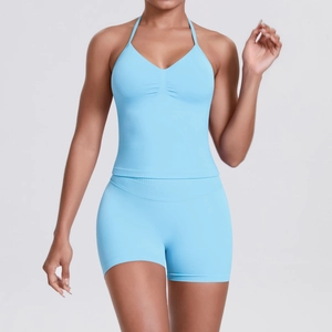 Close-up of light blue ribbed sports set featuring halter neck top and high waist shorts