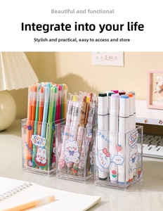 Close-up of clear acrylic stationery holder with cute cartoon rabbit and bear patterns
