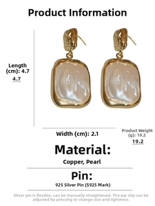 Detail view of pearl earrings with dimensions 4.7x2.1cm and 925 silver needles
