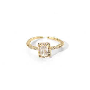 Bague ouverte dorée avec zircon rectangulaire et sertissage de diamants étincelants