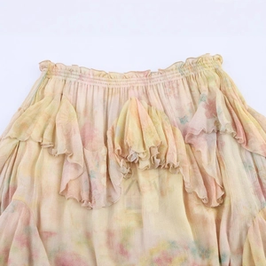 Floral chiffon tiered skirt in light yellow with elastic waist and ruffle details
