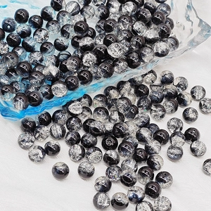 Macro view of 8mm black and white crackle glass beads for DIY jewelry making