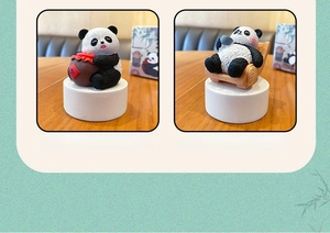 Detail of resin panda figurines featuring Chinese style drinking and tea-tasting themes