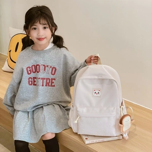 Cute white cartoon kitten backpack for kids with a plush toast charm on the side pocket