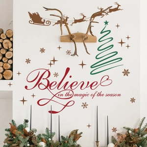 Detail of Believe magic Christmas wall decals with Santa sleigh and green pine tree art
