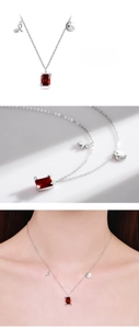 Detail view of S925 silver Aries necklace with red zircon and constellation symbol